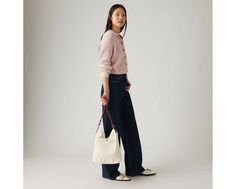 Our Bucket Bag was crafted with durable cotton and features two shoulder straps with a roomy interior. A durable bucket bag With two shoulder straps Features a roomy interior White Levis, White Bag, Shoulder Straps, Bucket Bag, Levi's, White, Shoulder Strap