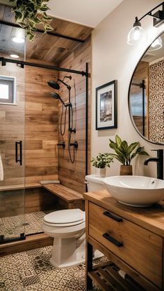 a bathroom with wood paneling and a white toilet sitting next to a walk in shower