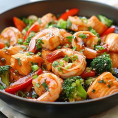 shrimp and broccoli stir fry in a skillet