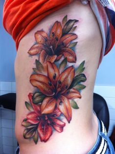 a woman's stomach with flowers on it