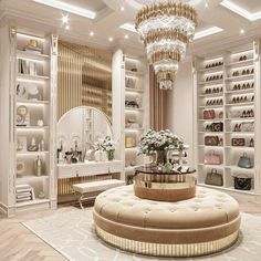 a room filled with lots of white shelves and chandelier