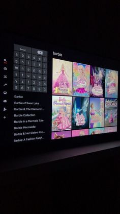 an image of a tv screen with barbie dolls on it's display wall in the dark