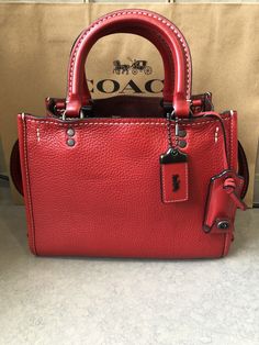 Coach 1941 Red Rogue 25 Satchel Bag 1. 100% authentic 2. Please refer to listing pictures for the condition of the bag. About shipment and Return policy Item is located in China and normally it will take around 2-3 weeks for the item to arrive in US. If you need the item urgently, please contact me in advance and I will quote you the DHL additional shipping charge. All the sales are final! No return and refund will be accepted. After purchase, you will receive a confirmation message with the retaken pictures for the item you bought. Shipment will be made only after receiving your confirmation message. I am an honest seller and only do business with serious buyers. Coach 1941, Satchel Bag, Satchel Bags, 3 Weeks, Women's Accessories, The Bag, Satchel, Return Policy, Shoe Accessories