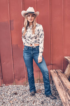 Step out in style in the Wrangler Bold Bucking Western Snap. Made with a soft cotton twill for softness and comfort, this classic shirt has pointed yokes, pearl snaps, and chest pockets for extra Western authenticity. Womens Western Button Up Shirts, Western Shirt With Snap Buttons For Rodeo, Fitted Western Shirt With Button Closure, Western Cotton Flannel Shirt With Button Closure, Western Snap Button-up Tops, Western Cowboy, Classic Shirt, Cowboy