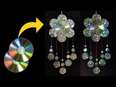 an image of a cd being hung from a chandelier with diamonds on it