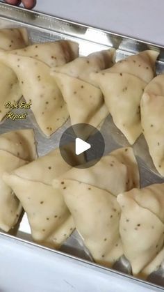 some dumplings are being cooked in a pan