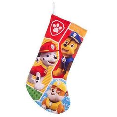 the paw patrol christmas stocking is hanging on a white background with an image of two dogs