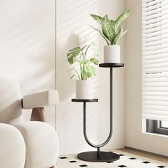 two potted plants are sitting on a black stand