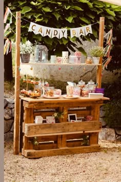 an outdoor candy bar is set up outside