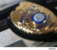 a police badge on top of a book