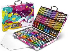 an open box of crayons next to a large case of colored pencils