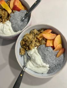 two bowls filled with oatmeal, fruit and yogurt