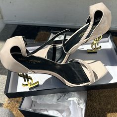 Never Worn Ivory/Off White Ysl Heels Size 39 Send Me An Offer Ysl Wedding Heels, Designer Cream Heels With Padded Heel, Luxury Cream Block Heel Shoes, Ysl White Heels, White Ysl Heels, Luxury Beige Heels With Sculpted Heel, Cream Patent Leather Heels For Evening, Designer Cream Heels With Open Heel, Ysl Pearl Heels