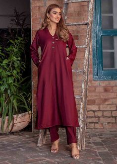 Elegant maroon Raw silk straight cut kurti with matching straight pant, kurti pant suit,silk salwar suit, Pakistani suit,semi formal Indian wear ✨This beautiful maroon silk suit has wodden button details over the front,with pockets on both sides.It can be customise in any other colour and in all size, please contact us regarding any changes if you want.We will make this dress as per your choice. ✨We use high quality fabric and threads for embroidery.You won't face any problem in future regarding Red Straight Kurta Pant Set For Eid, Traditional Long Sleeve Burgundy Sets, Festive Burgundy Long Sleeve Kurta, Festive Long Sleeve Burgundy Kurta, Maroon Kurti, Pakistani Salwar Suit, Salwar Kameez Pakistani, Pakistani Salwar, Kurti Pant