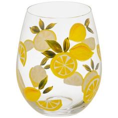 a glass with lemons and leaves painted on it