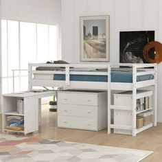 a white loft bed with drawers underneath it and a desk under the bed in front of it