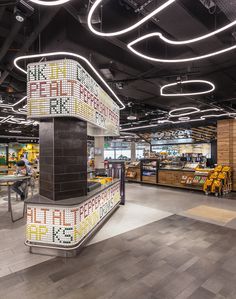 the interior of a grocery store with many items on display