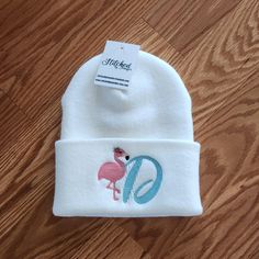 Initial and Flamingo Embroidered Beanie, Winter Hat.  Font shown on example is the default font if none is chosen. Please let us know if you have any questions.  One Size Fits Most -100% acrylic, hypoallergenic  -12" in length -Lengthapprox. 12" Uncuffed -Width7 1/2 Slouchy Hats, Carhartt Beanie, Embroidered Beanie, White Beanies, Brown Hats, Slouchy Hat, Embroidery Floss, Winter Hat, Embroidered Design