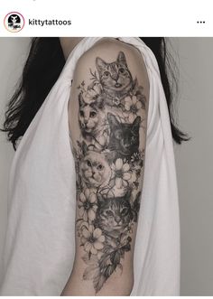 a woman with a cat and flowers tattoo on her arm