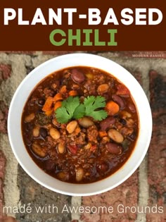 a white bowl filled with chili and beans