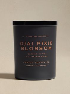 a candle with the words starry night written on it and an orange glow in the middle