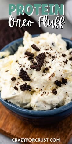 a blue bowl filled with ice cream and oreo cookies