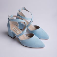 BLUE SUEDE SHOES, BLUE WEDDING SHOES, BLUE LOW HEELS, BABY BLUE SHOES, WEDDING HEELS, BLUE BLOCK HEELS, BLUE BRIDAL SHOES, CRISS CROSS HEELS As Eleanor Louise, we stand out with our Blue Suede heeled shoes that combine style and comfort. Specifically designed for brides, these shoes are crafted with high-quality materials. * Made from Blue Suede and Premium Vegan Leather, our shoes are equipped with an ankle strap that provides comfort throughout the day. * Completing your style and boosting your confidence is the most elegant way! Blue Suede 2.36-inch (6 cm) low-heeled shoes offer elegance and chicness with every step. Whether it's for daily wear or a special event, these shoes provide a sophisticated touch to your style. * Their classic and elegant design perfectly complements every wedd Cheap Blue Heels With 4-inch Heel, Luxury Light Blue Heels For Spring, Light Blue Luxury Heels For Spring, Cheap Light Blue Casual Sandals, Cheap Comfortable Light Blue Sandals, Cheap Blue Heels With Padded Heel, Cheap Blue Heels For Office, Cheap Blue Leather Heels, Cheap Light Blue Sandals For Spring