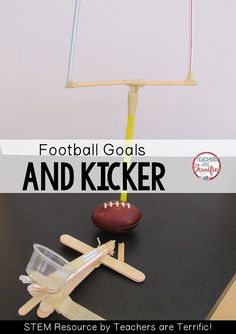 a football goal and kicker made out of popsicle sticks on top of a table