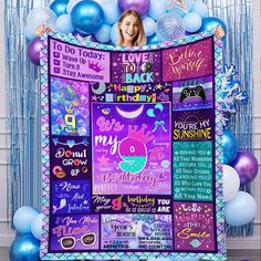 a purple and blue birthday banner surrounded by balloons