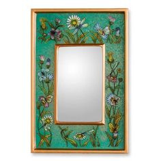 a mirror with flowers painted on it