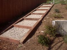 the steps are made out of wood and gravel