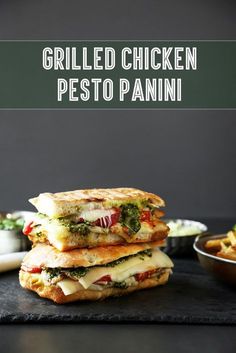 grilled chicken pesto panini stacked on top of each other