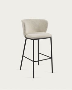 an upholstered bar stool with a black frame and white fabric on the seat