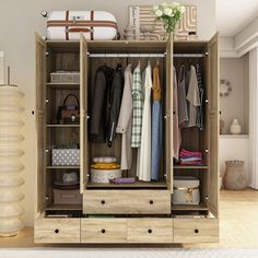 an open wooden wardrobe with clothes hanging on the doors and drawers in front of it