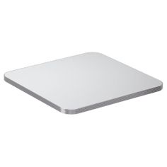 a white cutting board sitting on top of a table