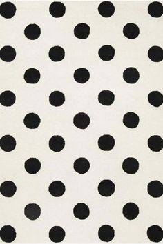 a black and white polka dot pattern on fabric