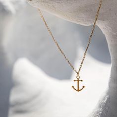 Moor yourself to windswept beaches, sparkling lighthouses and seaside memories. Sunny days blend best with sunset G&T’s, flowy threads and your chic Anchor Charm in 14k gold vermeil. Approximate dimensions: 23.5 mm x 19 mm Gold Coastal Jewelry Gift, Gold Nautical Jewelry For The Beach, Gold Nautical Jewelry For Beach, Nautical Style Gold Jewelry For The Beach, Anchor Charm, Gold Vermeil, Sunny Days, Arrow Necklace, Cross Necklace