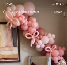 a bunch of balloons that are on the wall