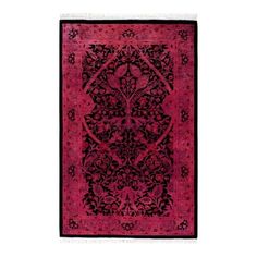 a red and black rug with an intricate design on the bottom, in front of a white background