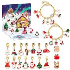 a christmas card and keychain set with santa's house in the background