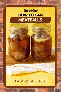 two jars filled with meatballs sitting on top of a wooden table