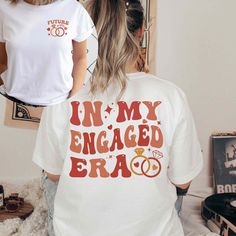 two women wearing t - shirts that say in my engaged era