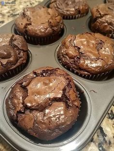 chocolate muffins in a baking pan ready to be eaten