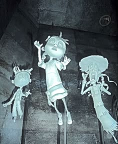 three cartoon figures are standing on the stairs