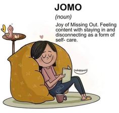 a woman sitting on a bean bag chair reading a book with the caption jomo