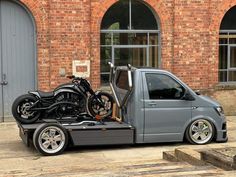 a motorcycle is parked in the back of a truck