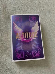 the front cover of an adult novel titled altitude, with pink and purple designs on it