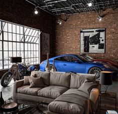 a living room filled with furniture and a blue sports car