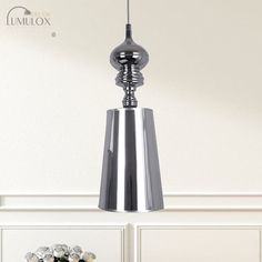 The Ilaria Metal Cone Pendulum Light epitomizes simplicity and elegance. With its sleek design and metallic finish, this pendant light is a perfect addition to any modern or contemporary space. The 1 head hanging pendant features a cone-shaped metal shade that exudes a warm and inviting glow. Available in both silver and gold, you can choose the one that best complements your dÃ©cor. With three different width options of 6, 8, and 10 inches, this pendant light allows you to customize the size according to your preference and the available space. Illuminate your living room, dining area, or bedroom with this stunning pendant light and create a stylish ambiance that is both chic and sophisticated.Size: 6" 8" 10" Fixture Width: 6" 8" 10" Fixture Height: 18.5" 23" 31.5" Bulb Included: No Numbe Pendulum Lights, Hanging Pendant Light, Fluorescent Light, Hanging Pendant, Hanging Pendant Lights, Silver Style, Design Silver, Hanging Pendants, Mid Century Style