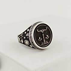 The ring is made of 925 sterling silver with fine workmanship. Planets, stars and comets are embroidered on the sides of the ring. PRODUCT FEATURES * Mineral Production: 925 Sterling Silver, Bronze * Weight: 13.5 grams * Ring Diameter: 18 mm Libra on the ring, sun, moon and star embroideries are made on the sides. The ring can be changed upon request. * Ready to Ship in 1-3 Business Days * Shipped within 1-3 business days worldwide with free express shipping. * The product will be sent to you wi Celestial Silver Rings With Polished Finish, Symbolic Zodiac Sign Rings, Celestial Silver Signet Ring, Silver Celestial Signet Ring As Gift, Celestial Silver Signet Ring For Gift, Silver Celestial Style Signet Ring For Gift, Celestial Silver Rings Stamped 925, Silver Zodiac Sign Rings As Gift, Silver Zodiac Sign Rings For Gift